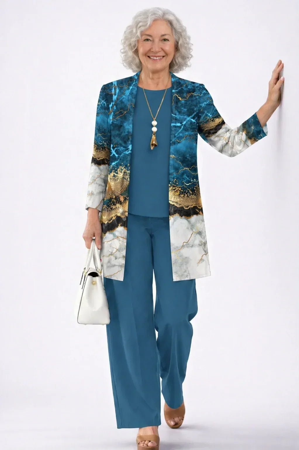 Conjunto de tres piezas azul petróleo con chaqueta marmolada - Foto 1