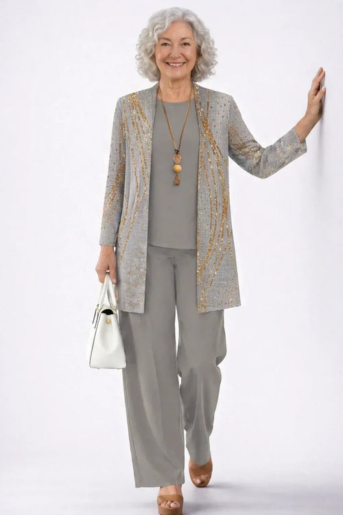 Conjunto de tres piezas gris perla con detalles dorados - Foto 1