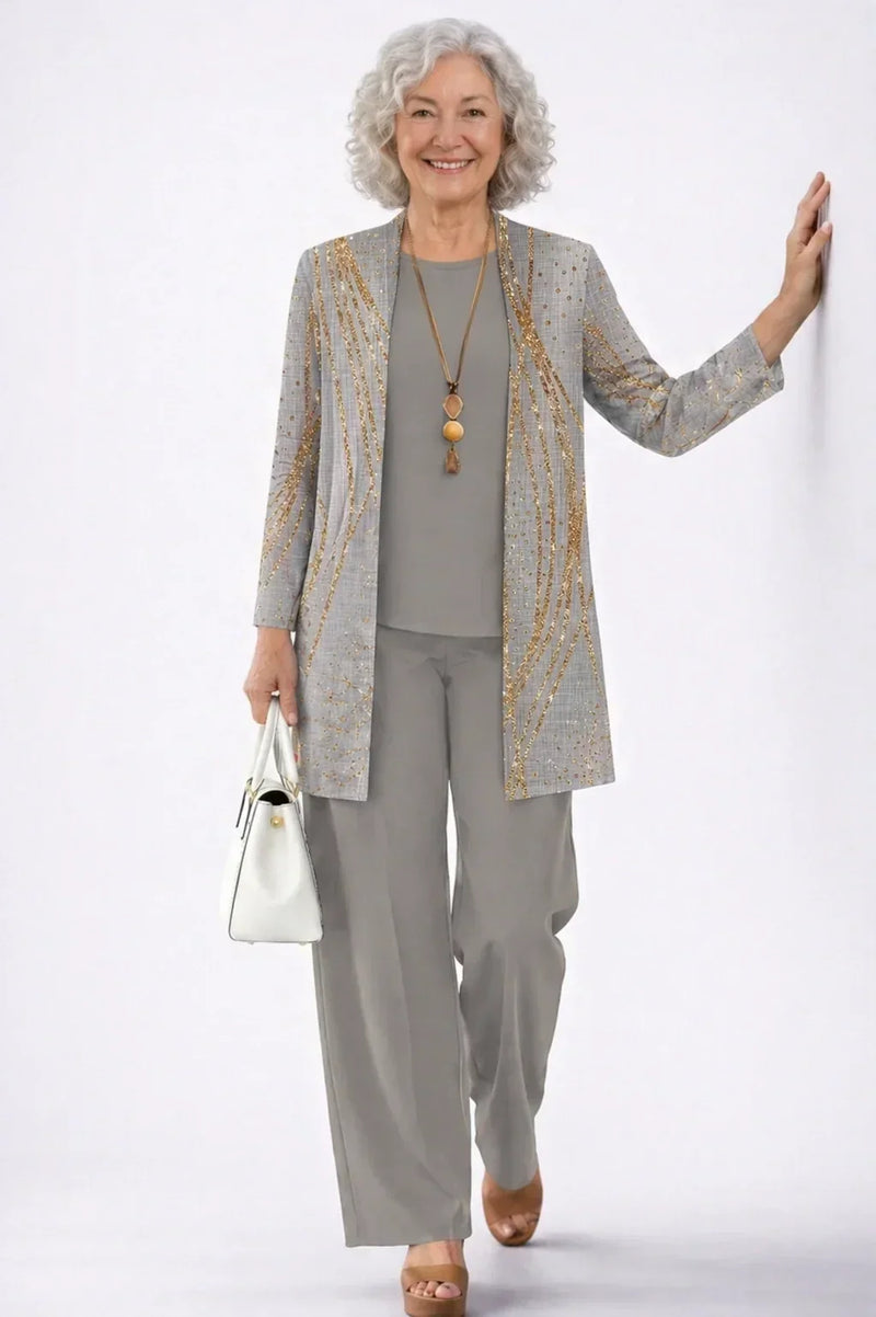 Conjunto de tres piezas gris perla con detalles dorados - Foto 1
