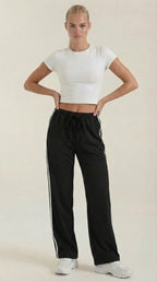 Pantalón deportivo ancho de mujer con franjas laterales - Foto 8